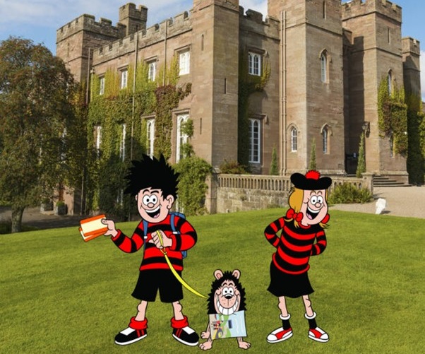 cartoon characters in front of a large historic building