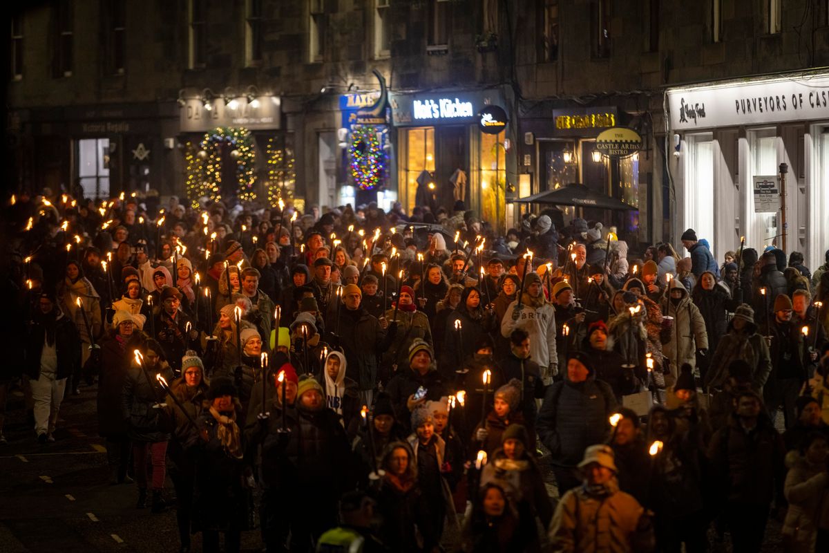 Torch carriers at Edinburgh's Hogmanay Torchlight Procession