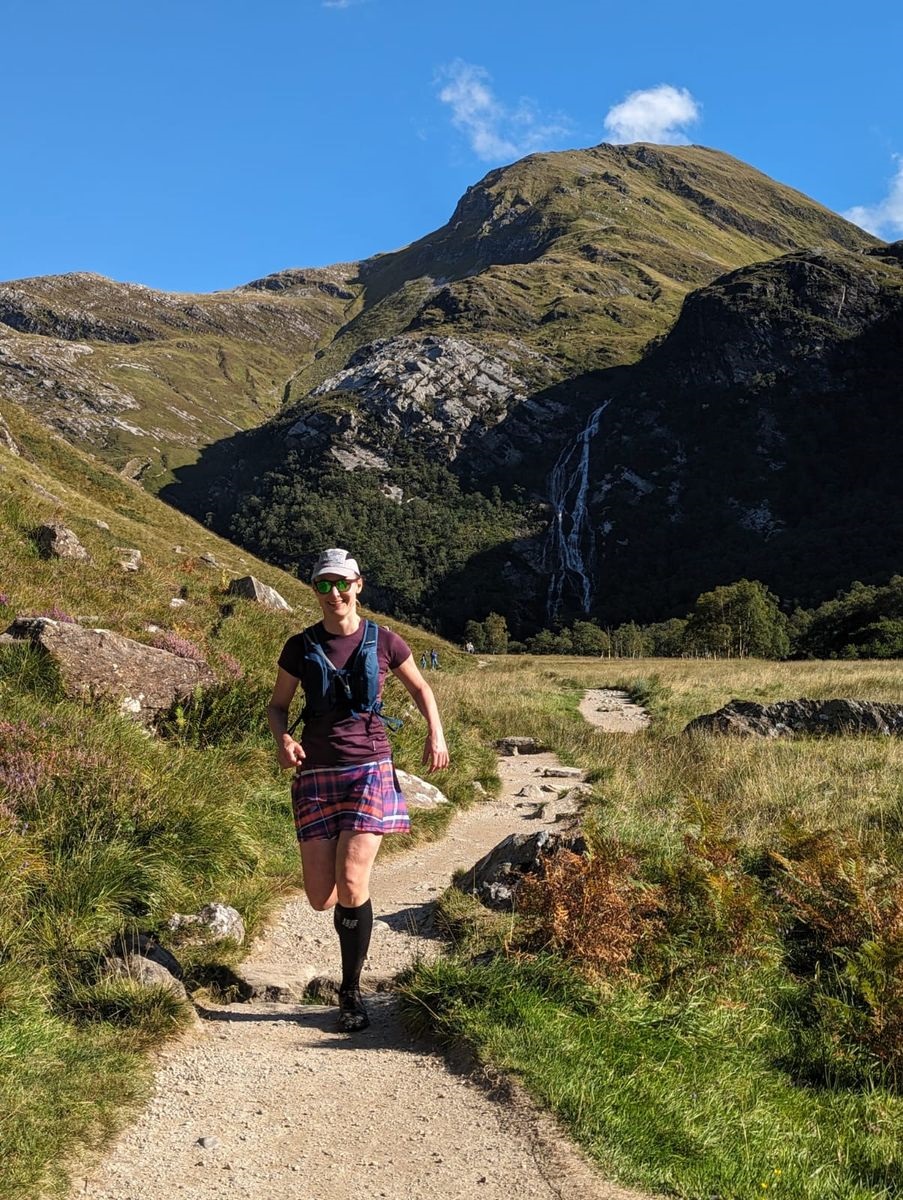 A kilted woman doing hill running