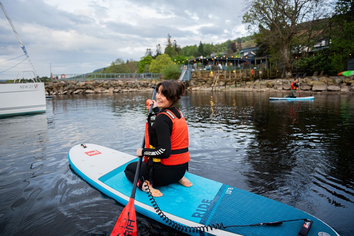 Paddleboarding in front of The Ferryman's Inn.