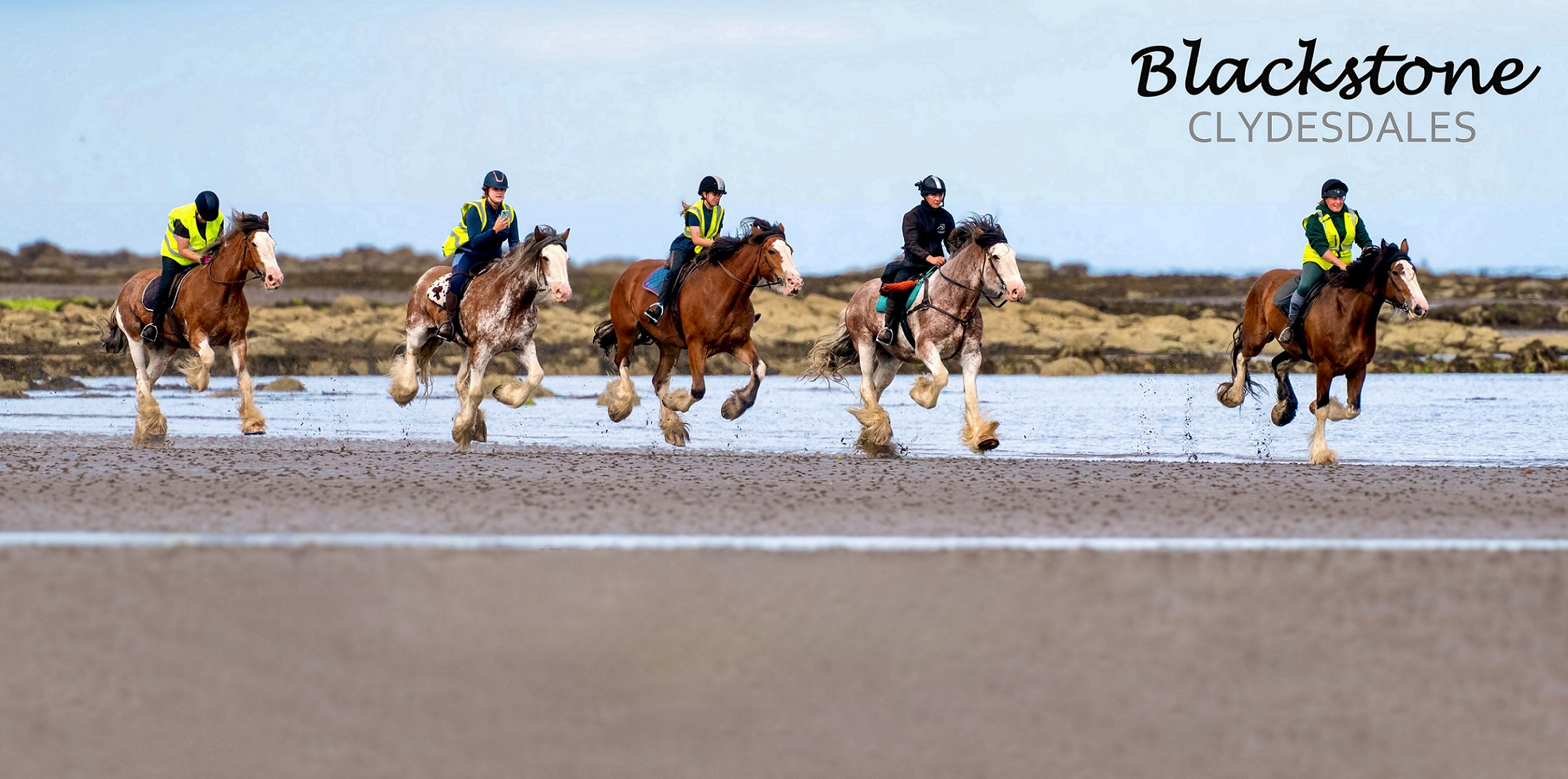 Horseriders on the beach