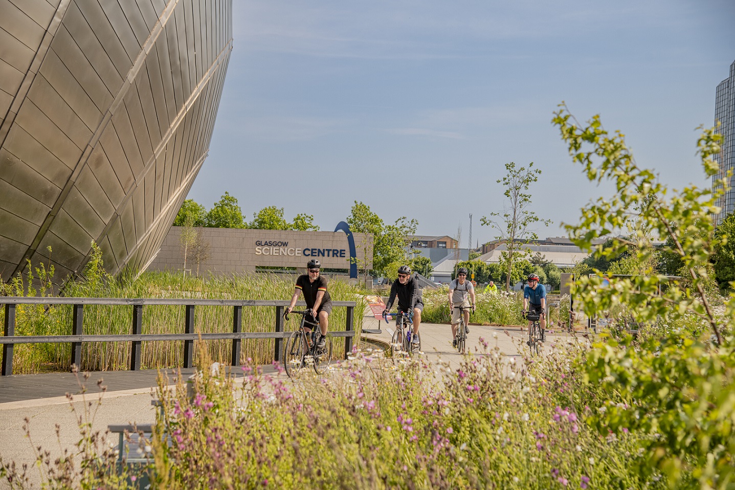 Cyclists outside Glasgow Science Centre