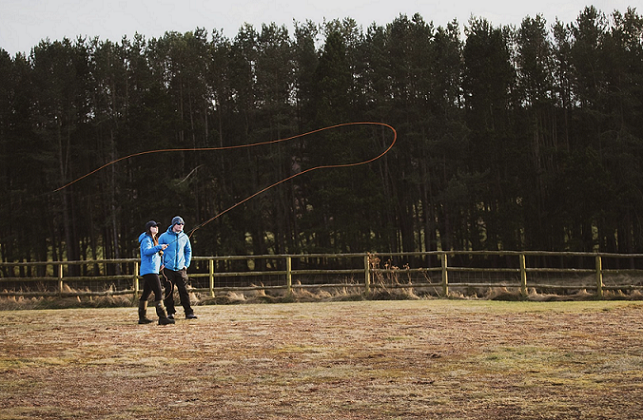 Two people fly fishing near the River Dee in Aberdeenshire